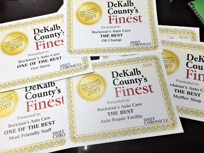 Pile of Daily Chronicle DeKalb County's Finest Awards